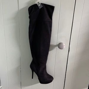 Never worn over the knee boots.